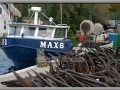 Net Anchors and Fishing Boat