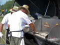 Cooking brats on the World's Largest Grill at EAA AirVenture