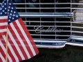 Small Flag in front of '70s-vintage Cadillac