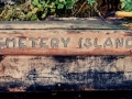 Cemetery Island sign on dock