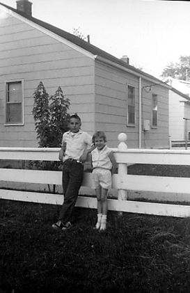 1961+Phil+and+Peg+by+Fence-3163798988-O